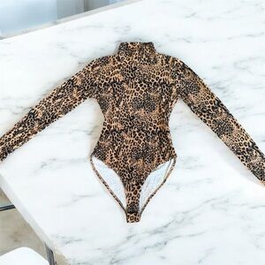 Forever 21 Tan and Black Kids Bodysuit